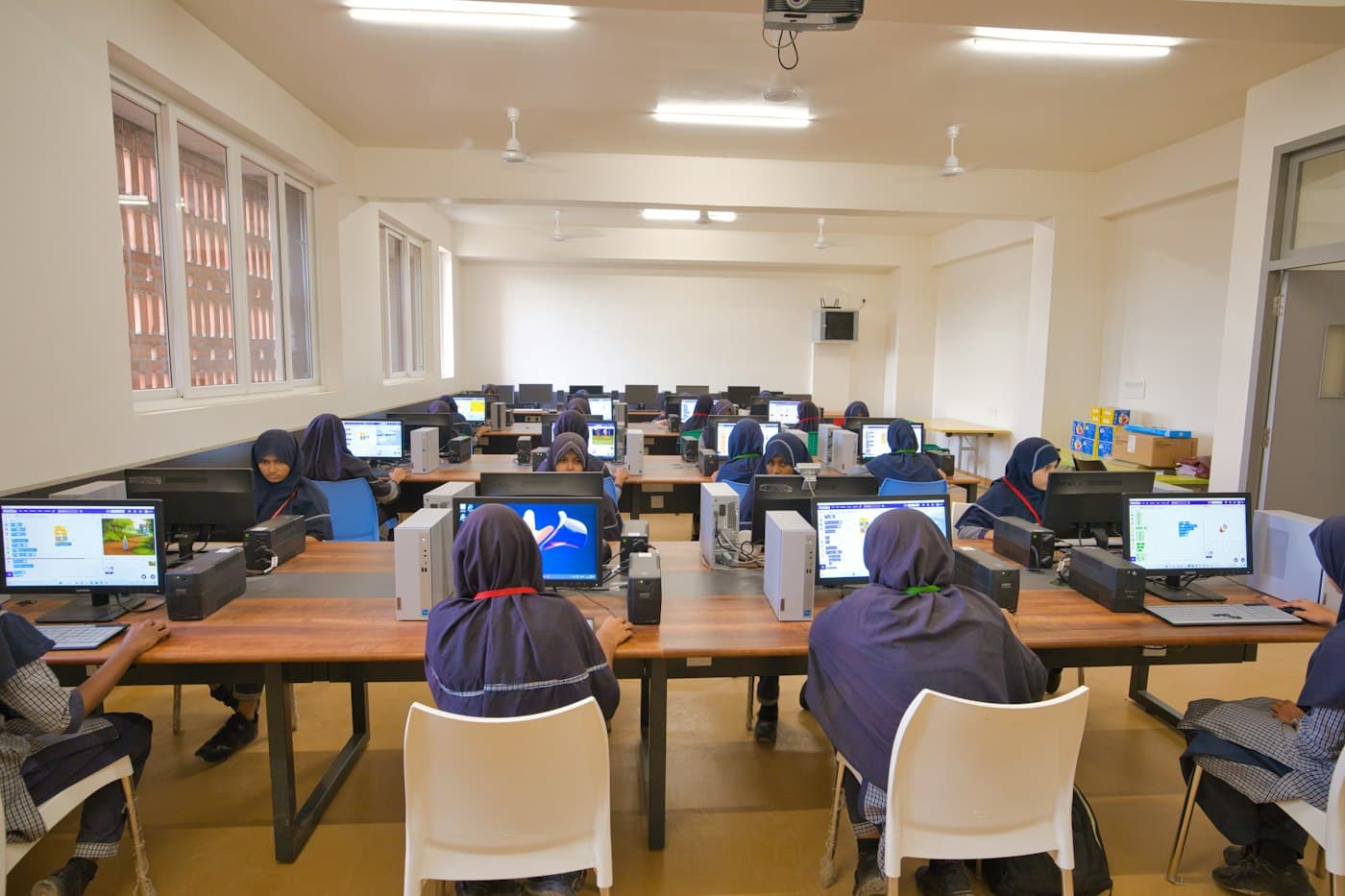 High school students working in a computer lab in GetLeaning
